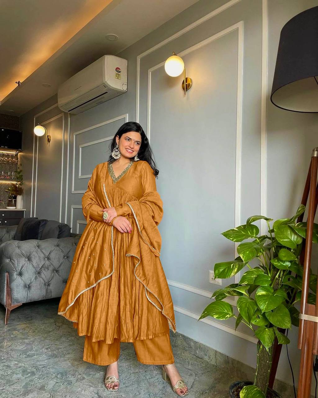 Anarkali-style kurta set with matching pants and dupatta